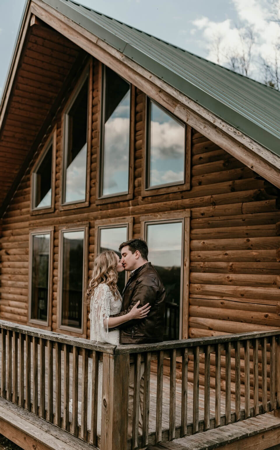 mountain elopement at woodsy maryland cabin newlyweds kissing photo