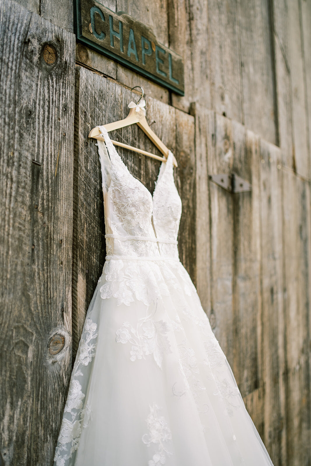 Brides wedding dress hanging at Union Hill inn in Sonora CA