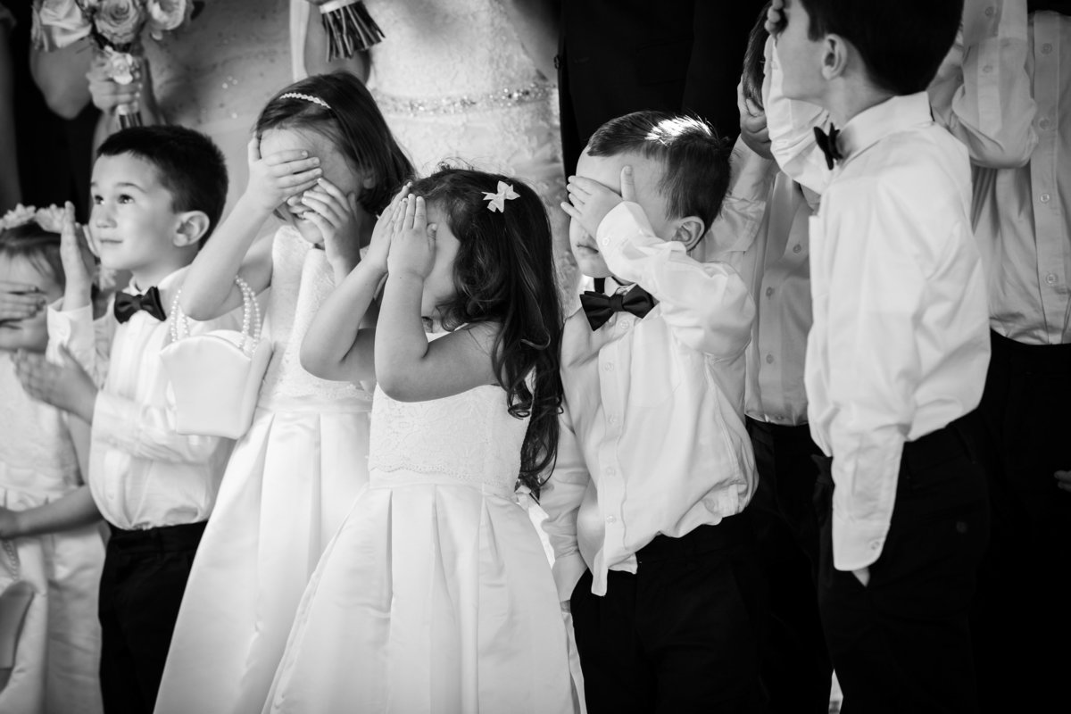 driskill wedding photographer children covering eyes 604 Brazos St, Austin, TX 78701