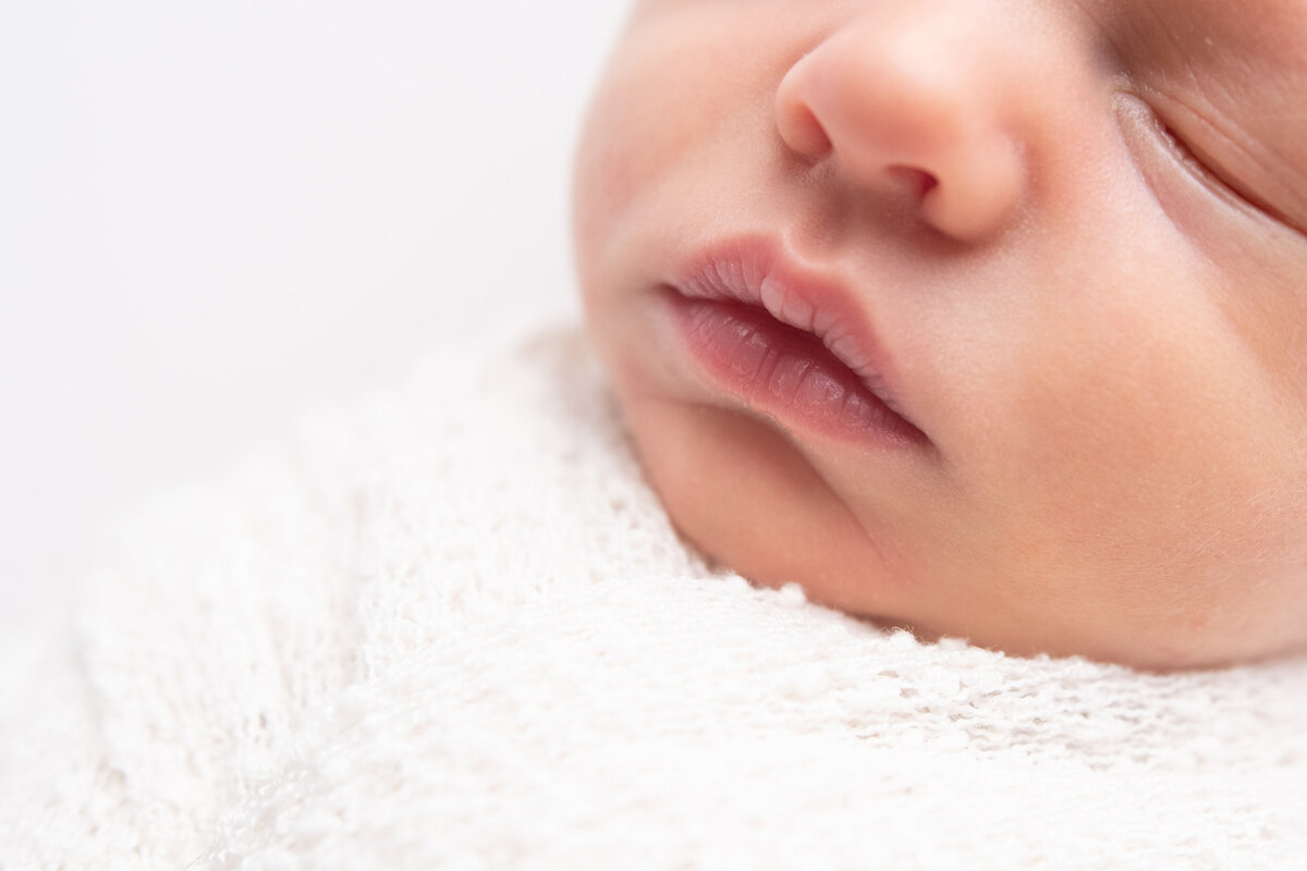 close up details of newborn baby's mouth