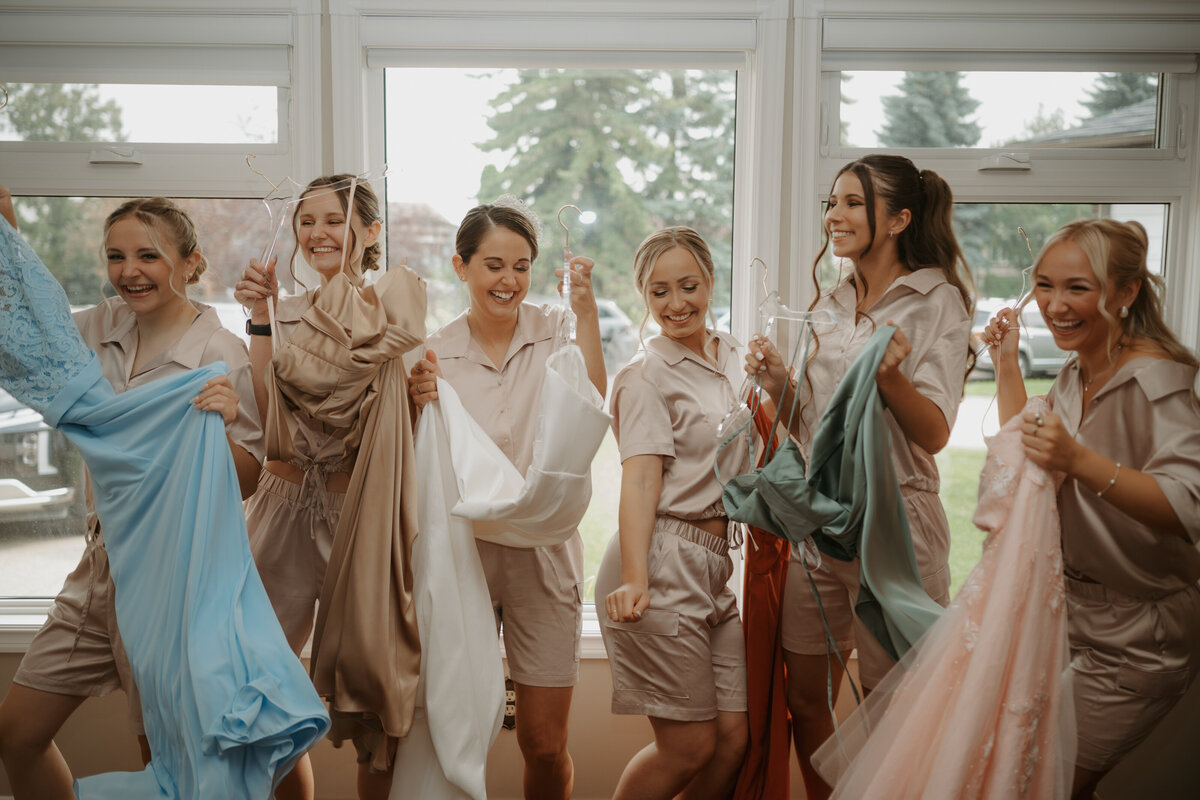bridesmaids dancing on wedding morning