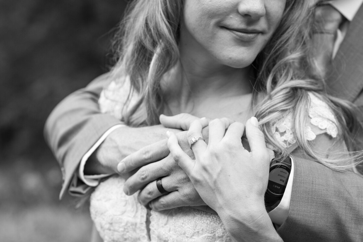 Wedding couple snuggling