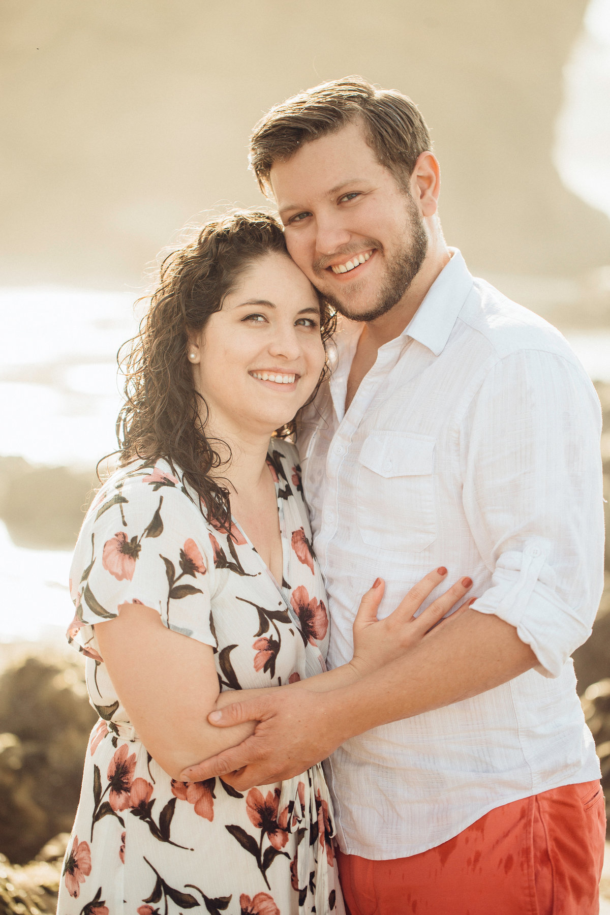 Engagement Photograph Of  Man And Woman Smiling While Holding Each Other Los Angeles