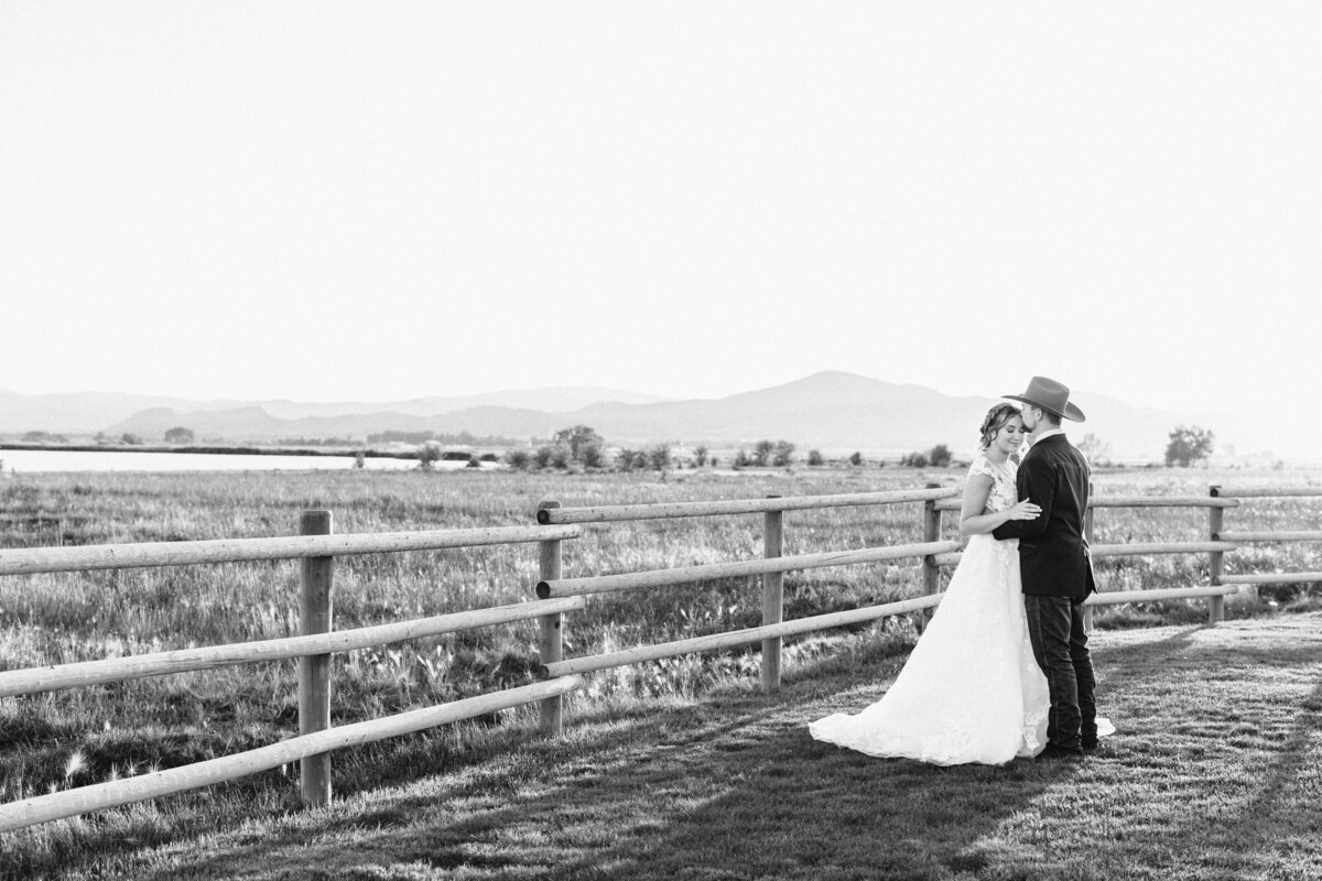 Elevate your wedding memories with stunning sunset photos at Udiamond Barn in Helena, MT. Our picturesque venue offers the perfect backdrop for romantic and breathtaking moments captured in timeless photographs. Discover the charm of rustic elegance amidst Montana's beauty as the sun sets over our scenic grounds. Let us preserve your special day in unforgettable images filled with warmth, love, and the magic of a sunset at Udiamond Barn
