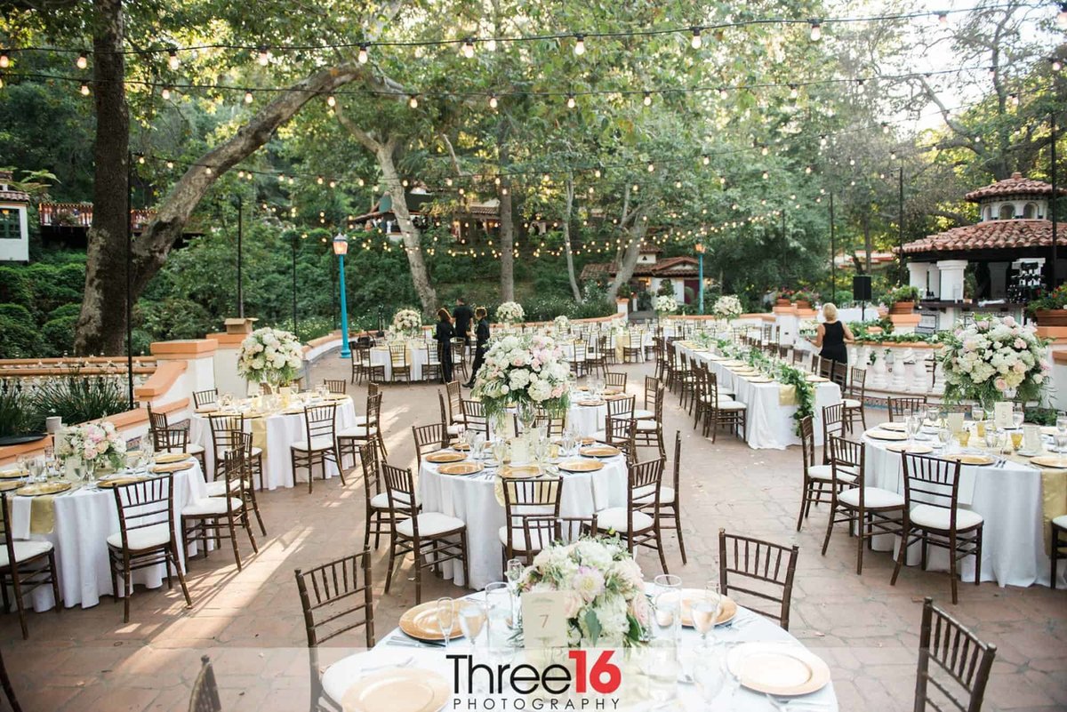 Outdoor Wedding Reception area setup with tables for guests