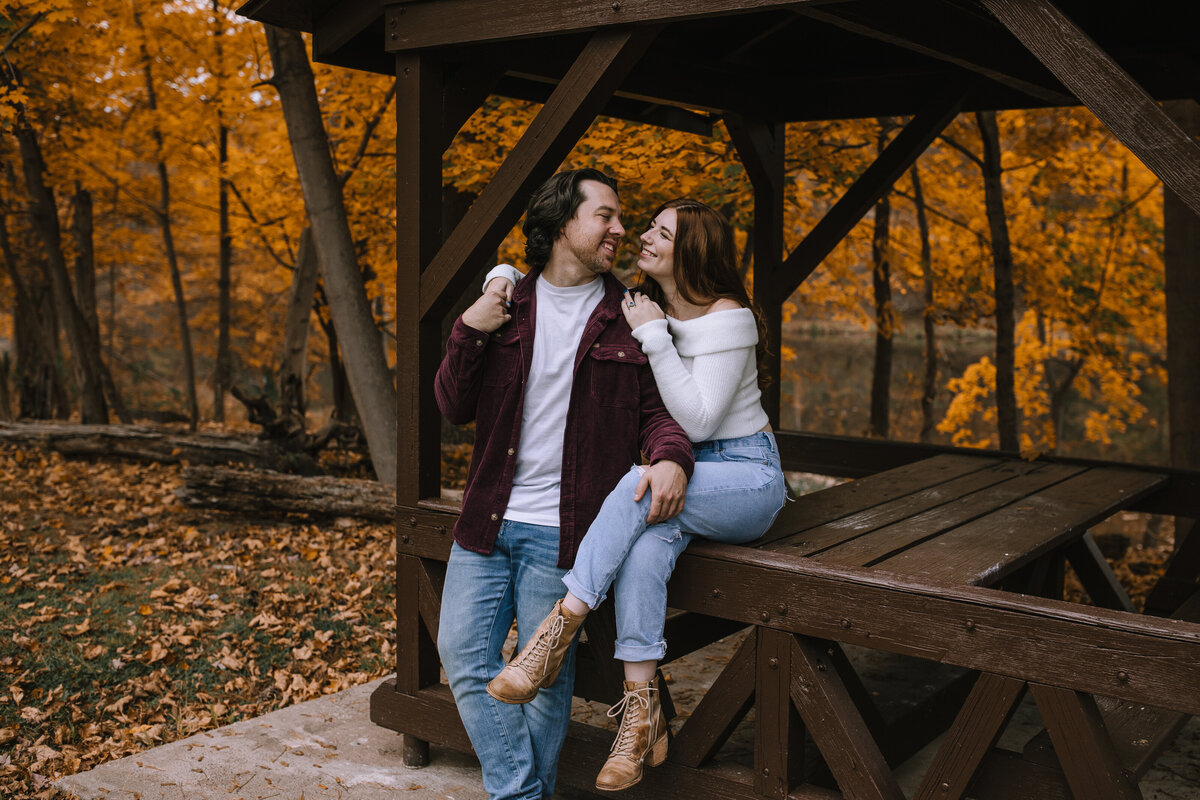 Engaged couple in North Park during the fall.