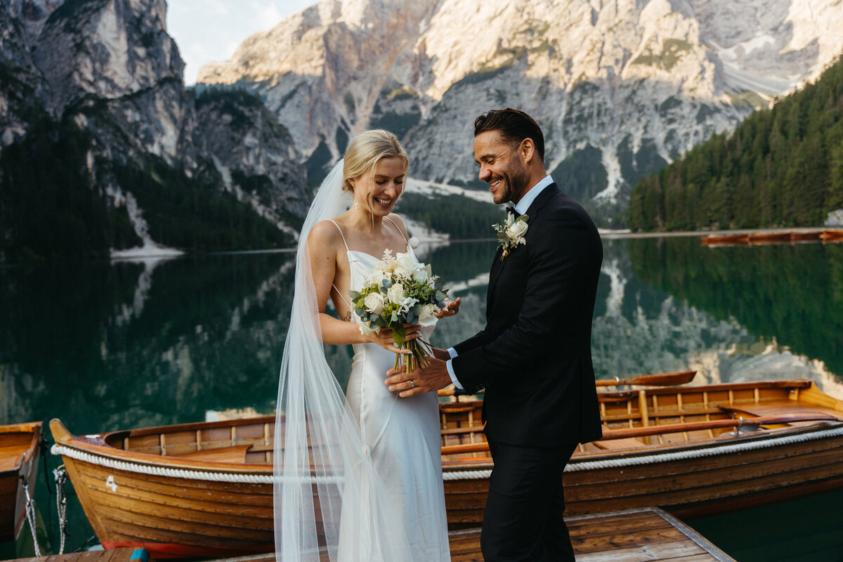 Scenic view of Lago di Braies docks surrounded by mountains