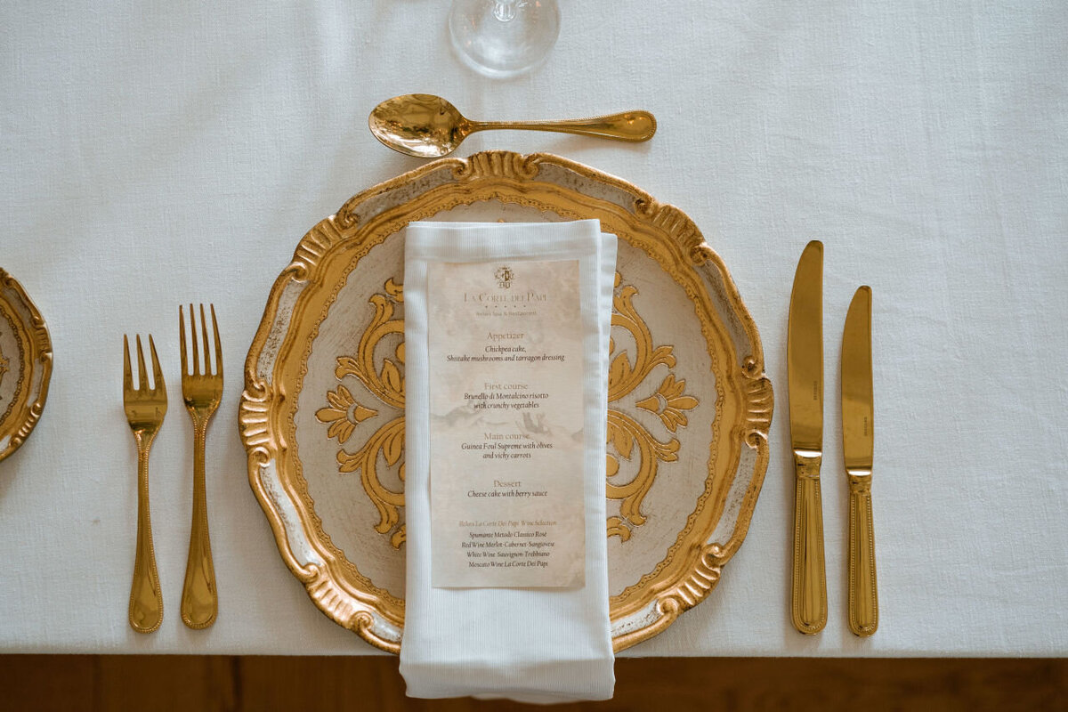gold place setting for luxury wedding