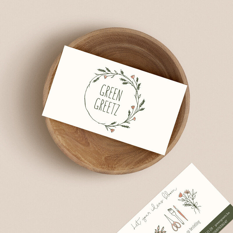 botanical wreath logo design on business cards