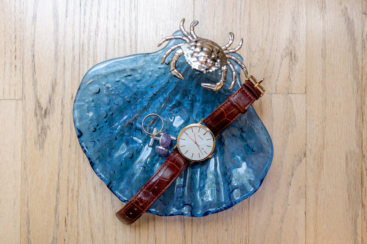 Groom's watch on crab dish