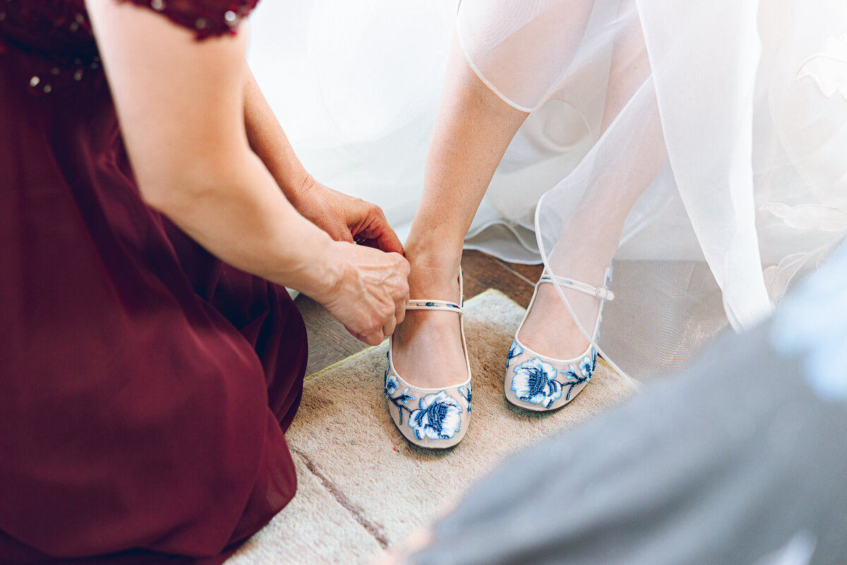 A bride gets dressed for her wedding at The Joinery in Chicago