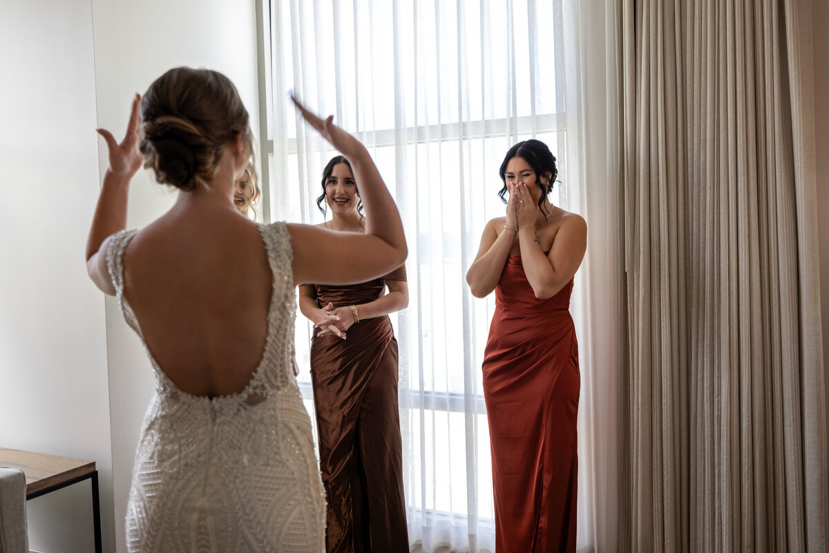 Florida Wedding Photographer and Videographer Orlando Weddings Candid Brides maid first look