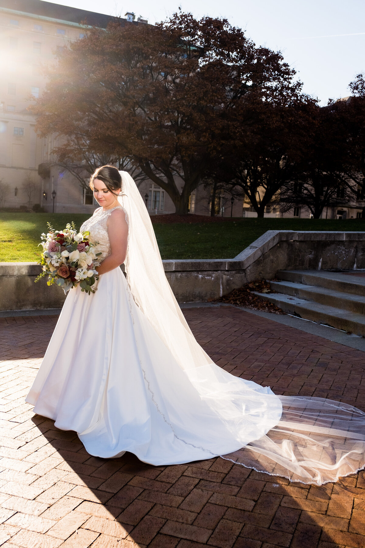 bride posing for wedding photo in december