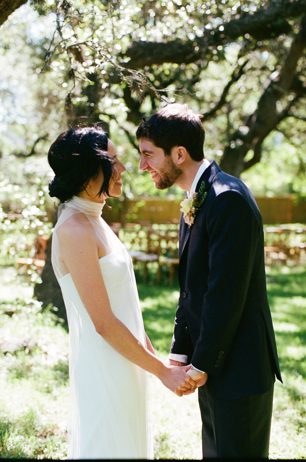 Bride and groom wedding portraits in the grounds of Mattie's wedding venue in Austin