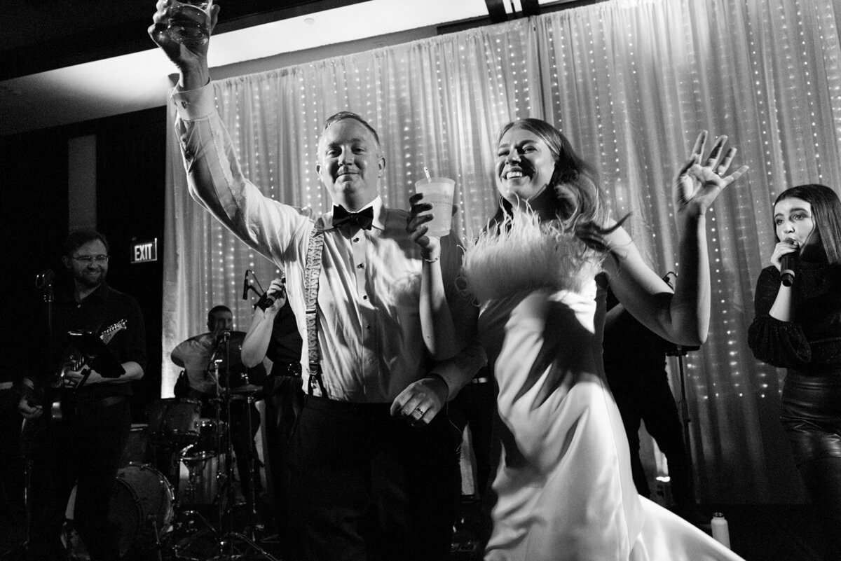 bride and groom walk back down the aisle after their Jewish ceremony at Devil's Thumb Ranch in Colorado with Jenna Wren Photography