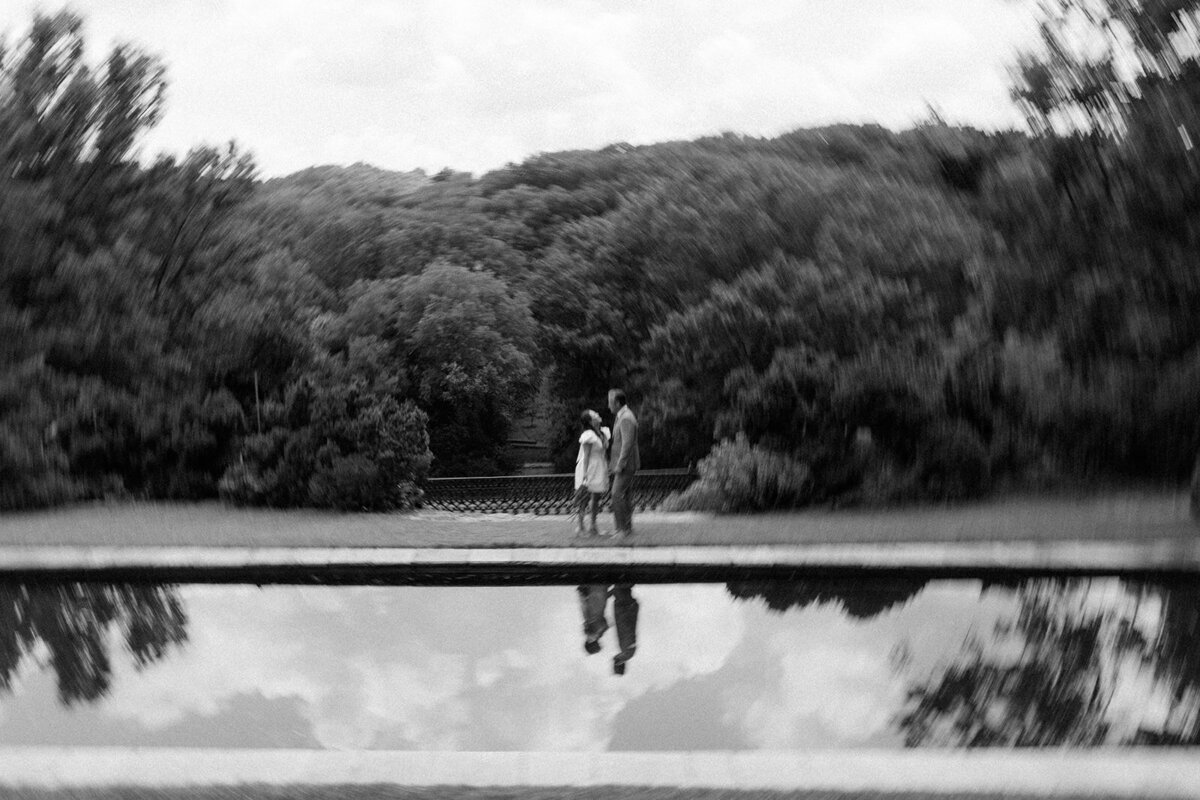 Couples reflection shown in the reflection pond at the Cheekwood Garden in Nashville. 