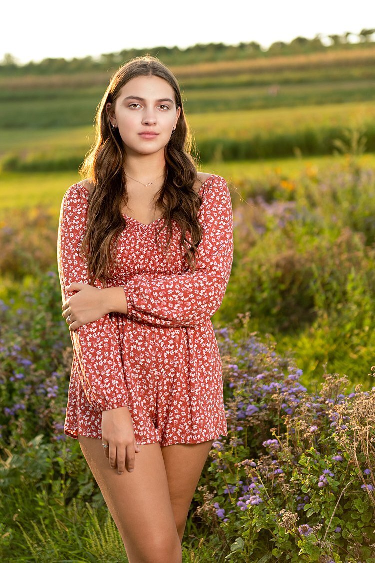 High school senior girl in flower field at Simmons Farm