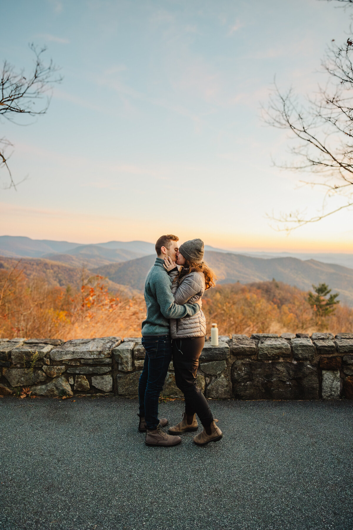 A couple kisses at Shenandoah National Park.