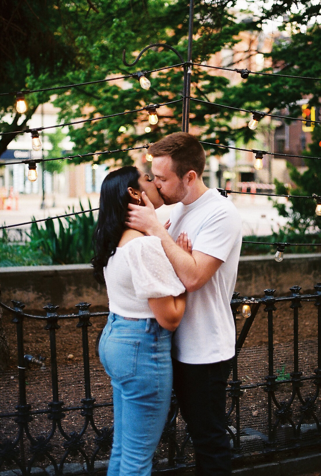 35mm film photo of couple kissing