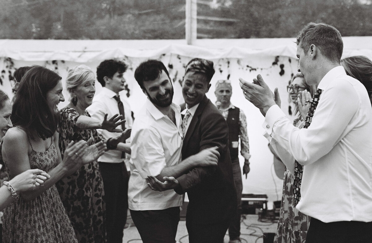 Ceilidh dancing at Devon marquee wedding