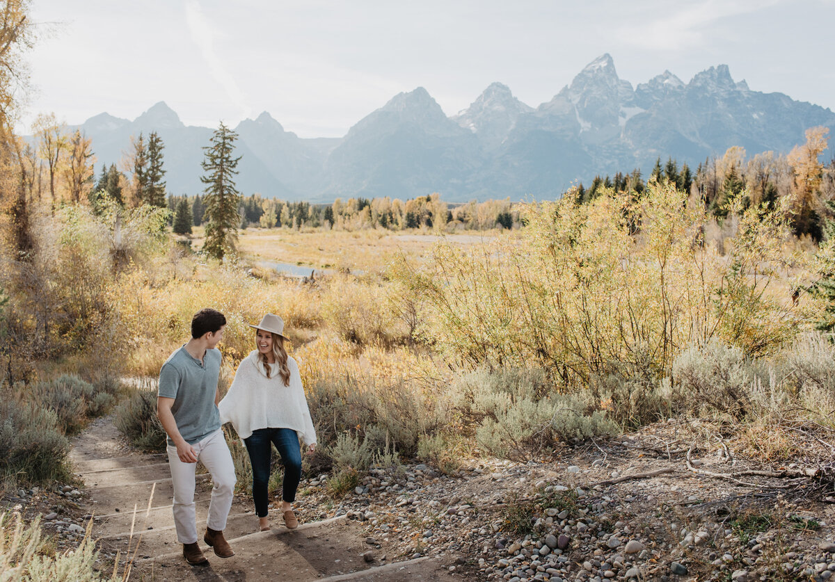 Photographers Jackson Hole capture couple walking through Grand Teton National PArk