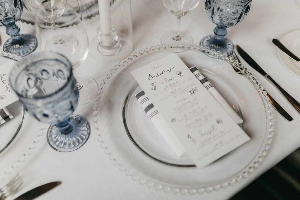 Blue and white reception tablescape by Coco & Ash, an intimate and modern wedding planner based in Calgary, Alberta.  Featured on the Brontë Bride Vendor Guide.