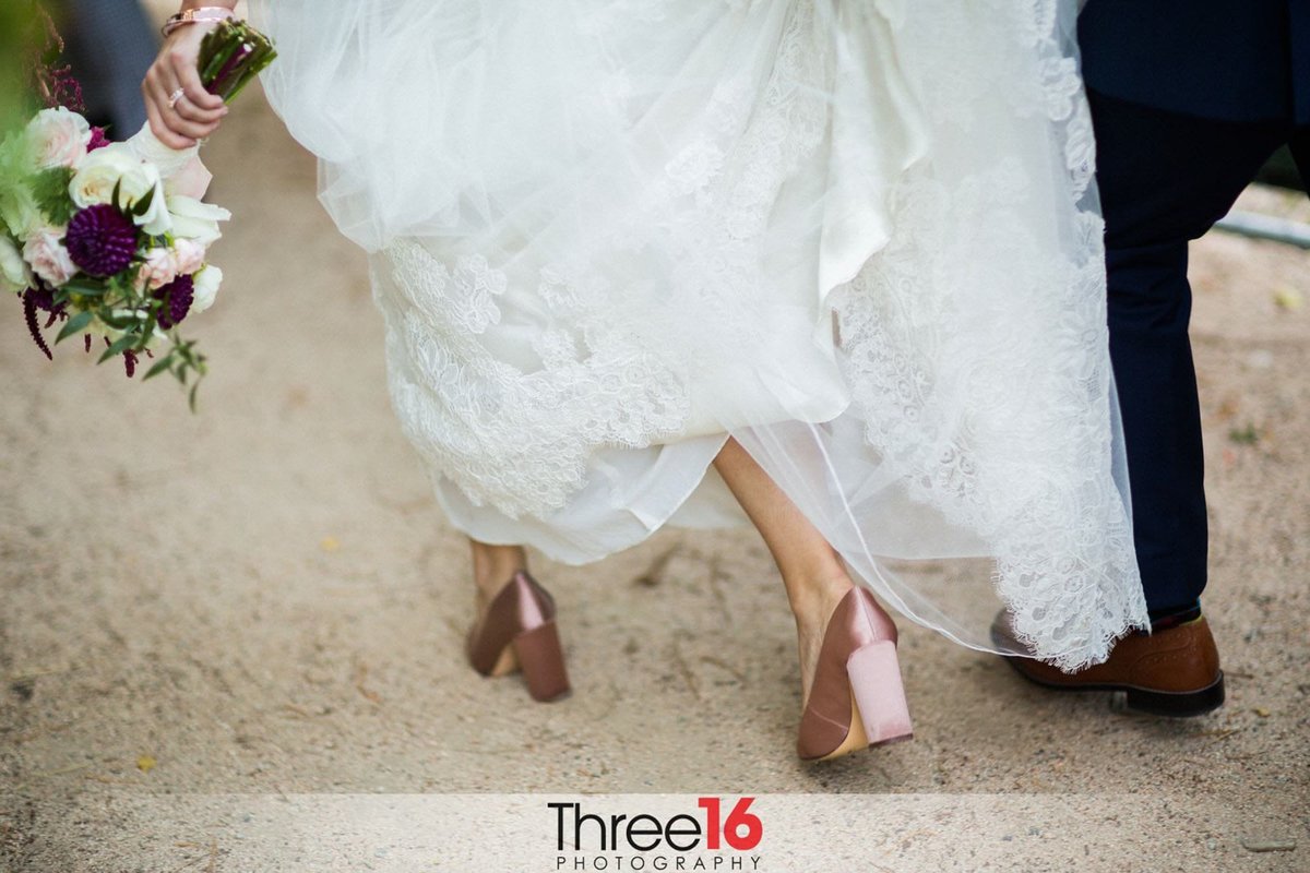 Bride walking in her shoes