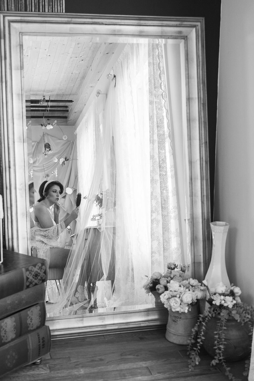 bride in lingerie sitting in front of mirror in Grand Rapids MIchigan