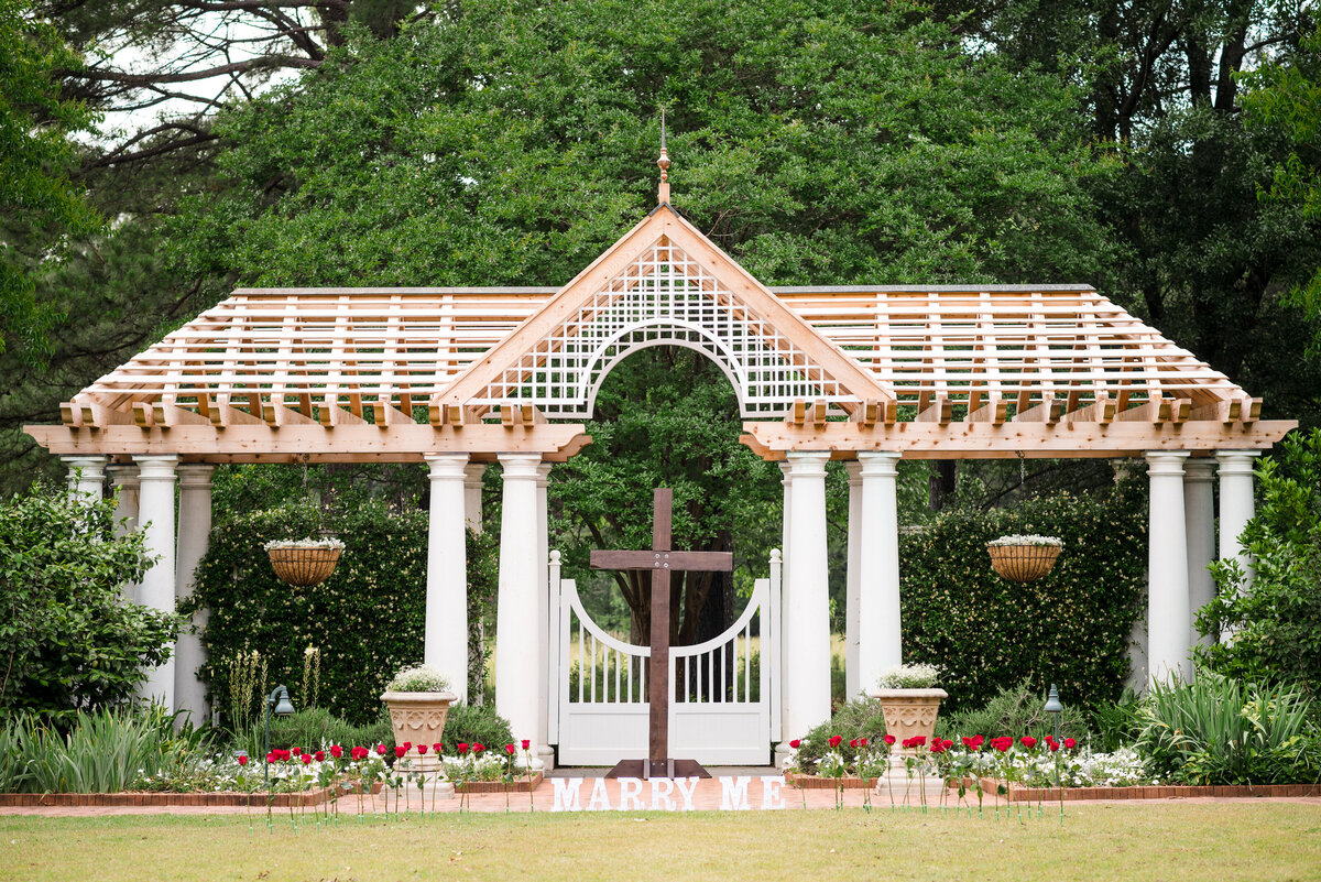Romantic proposal setup at Daniel Stowe Conservancy photographed by proposal photographer in Charlotte.