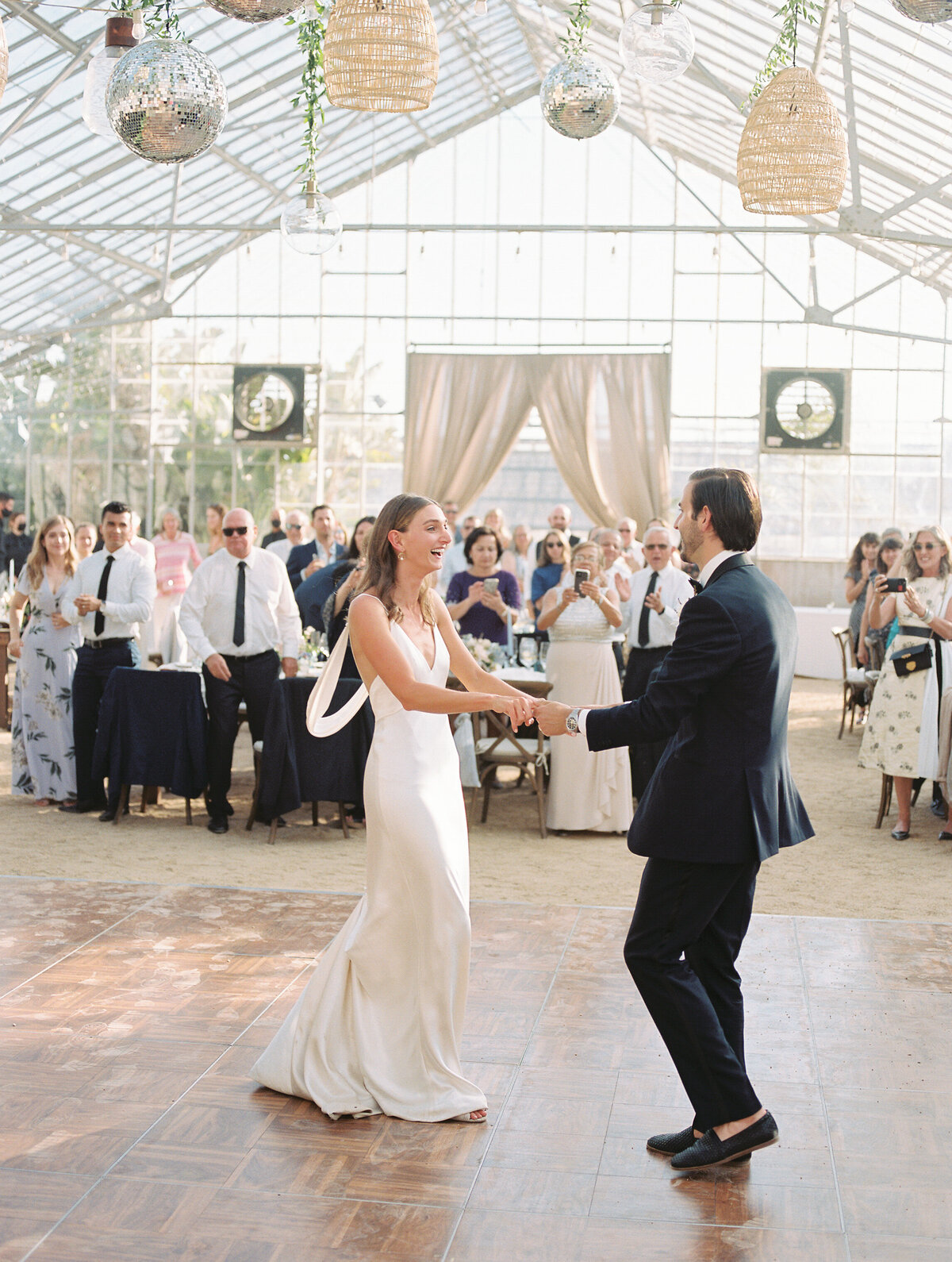 couple during first dance at dos pueblos orchid farm