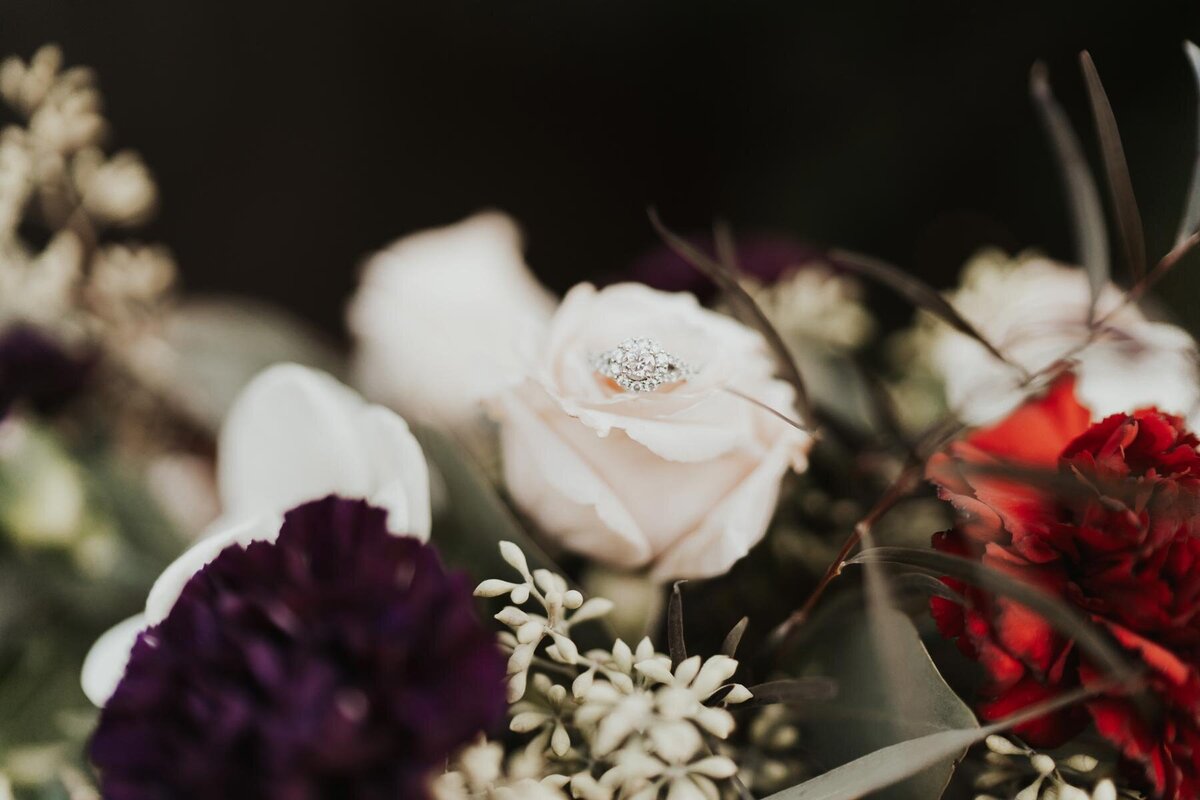 diamond-wedding-ring-bouquet-roses