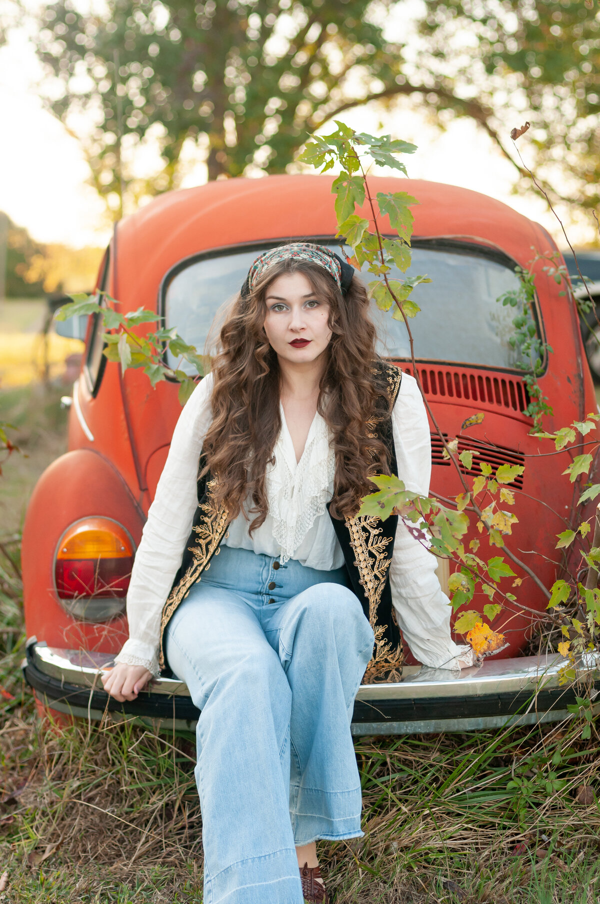 Kentucky Photographer: Portrait of a woman on the back of a red vintage car.