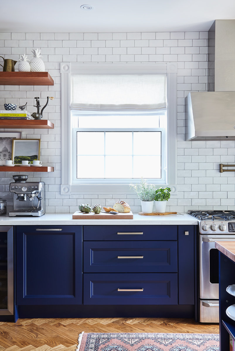 blue kitchen cabinets and subway tile backsplash in Burlington interior designer's home