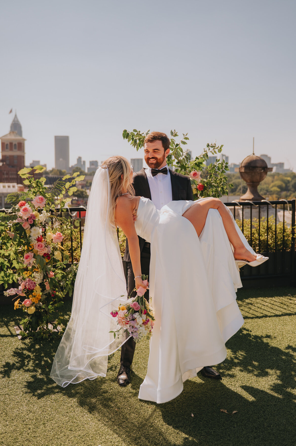 Two people lean in for a kiss on their elopement day