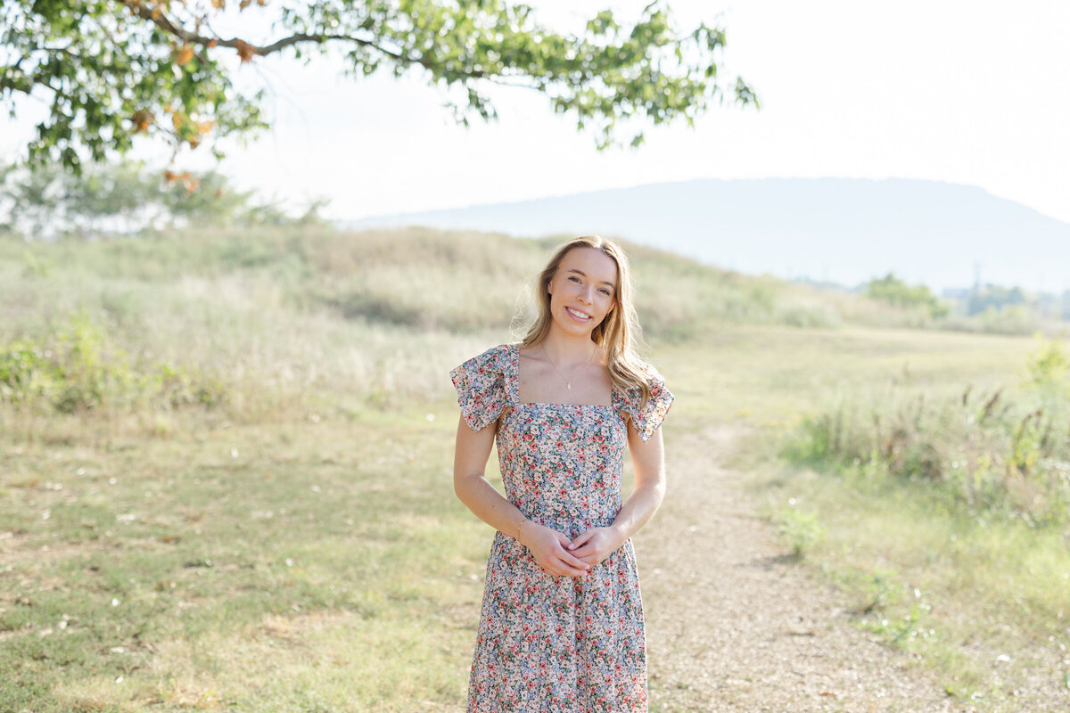 high school senior girl posing at the Sculpture Fields in Chattanooga