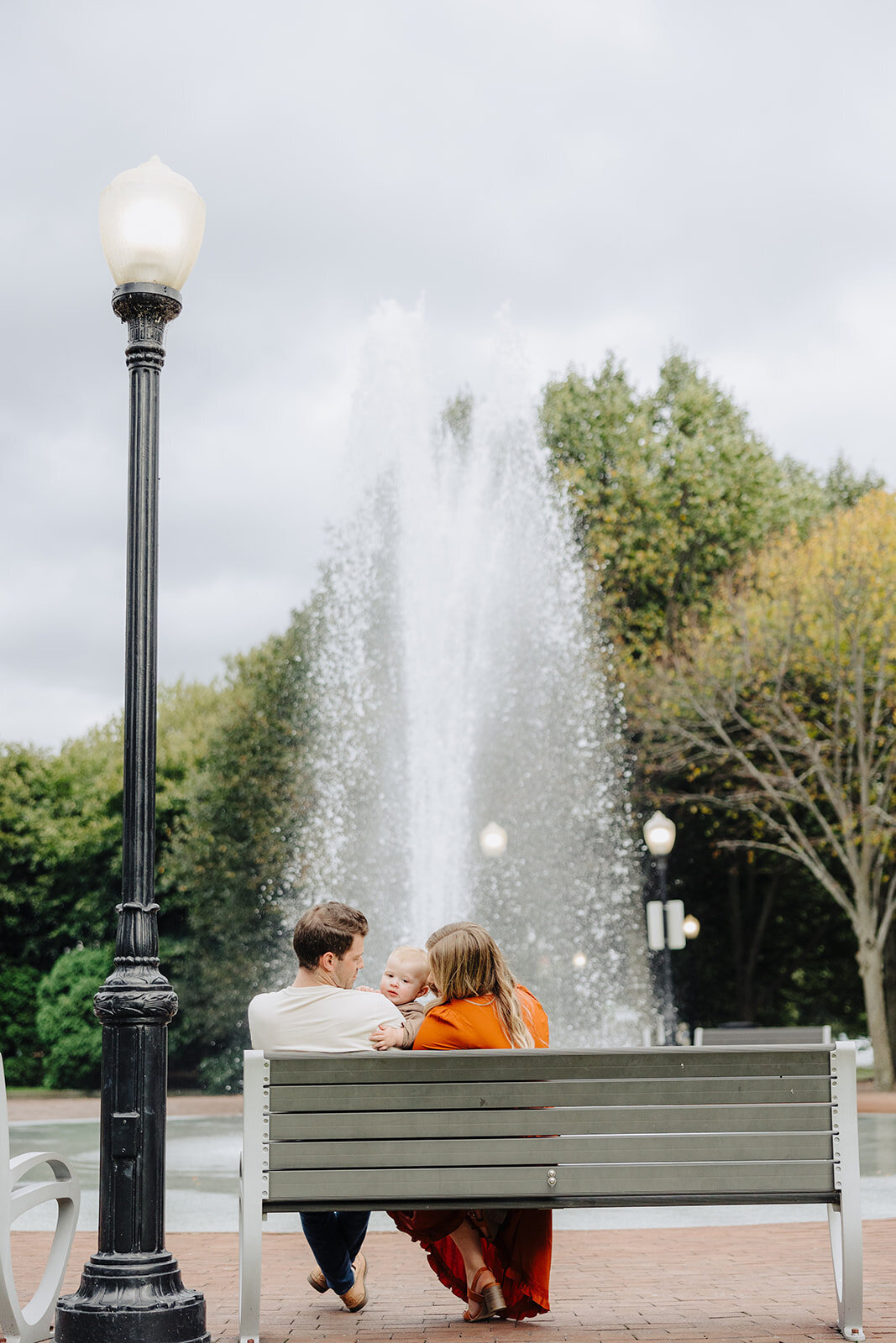Couple in a park in the Finger Lakes for a family session