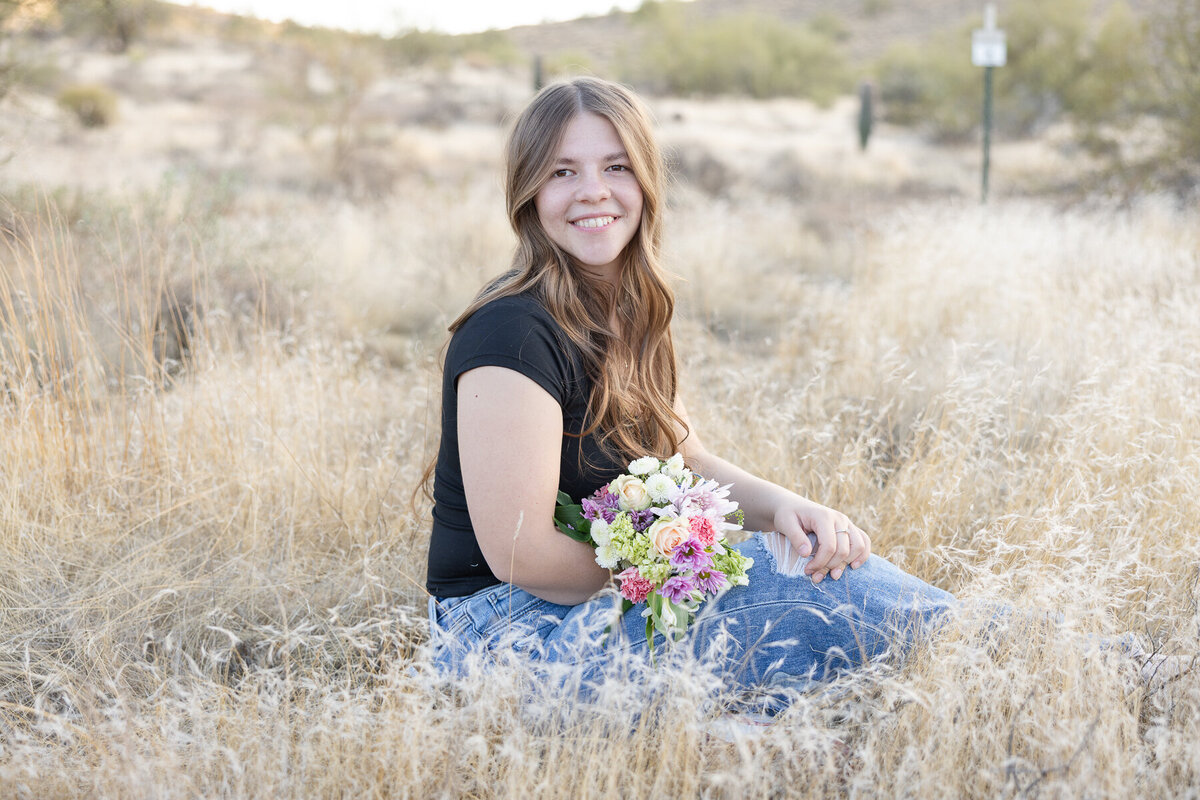 high school senior picture in golden hour in the desert
