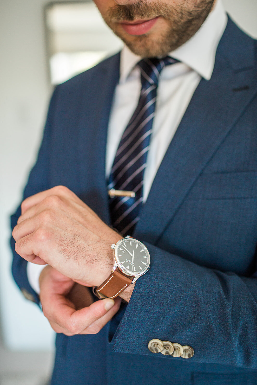Groom opened gift from bride. It was a Watch