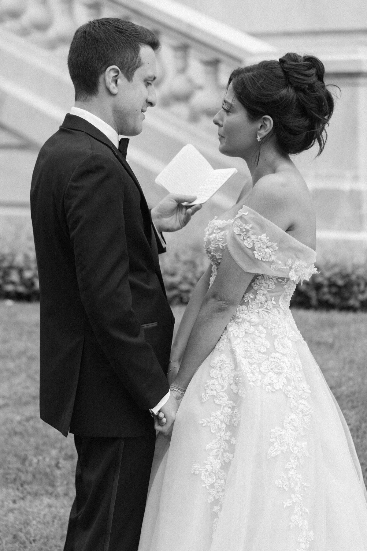 Bride and Groom cry together as they privately read vows.
