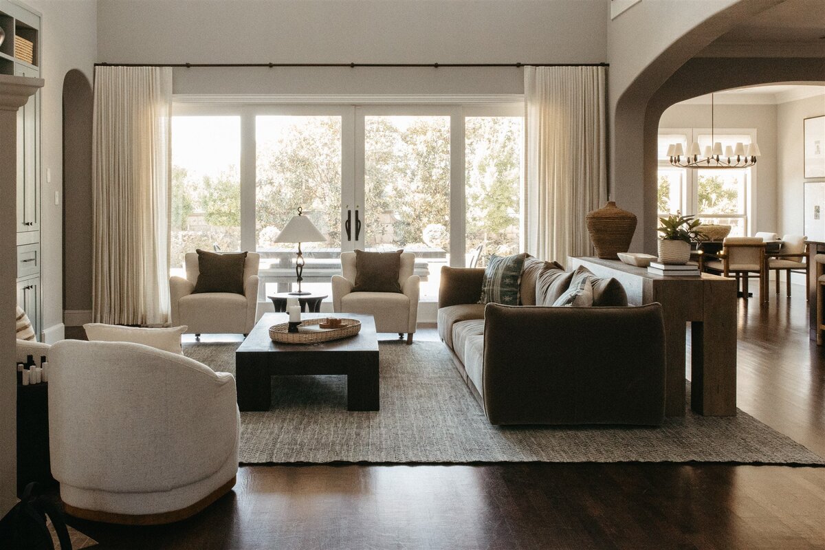 Open concept minimalist living room designed by Hope Miriam Designs in DFW