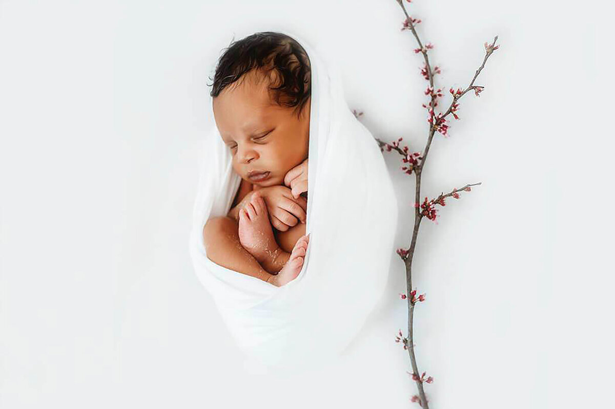 Infant posed for Newborn Photos in Charleston, SC.