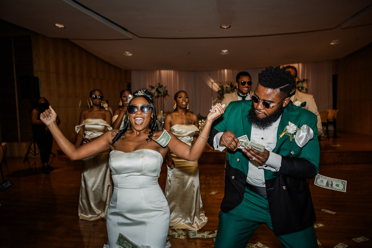 Bride and groom money dance during their wedding reception