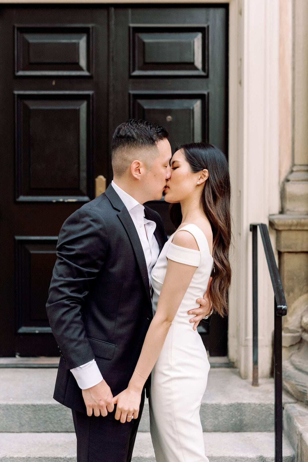 Romantic Modern Editorial Couple Embrace in front of Toronto Post Office Engagement Downtown Financial District Romantic Jacqueline James Photography