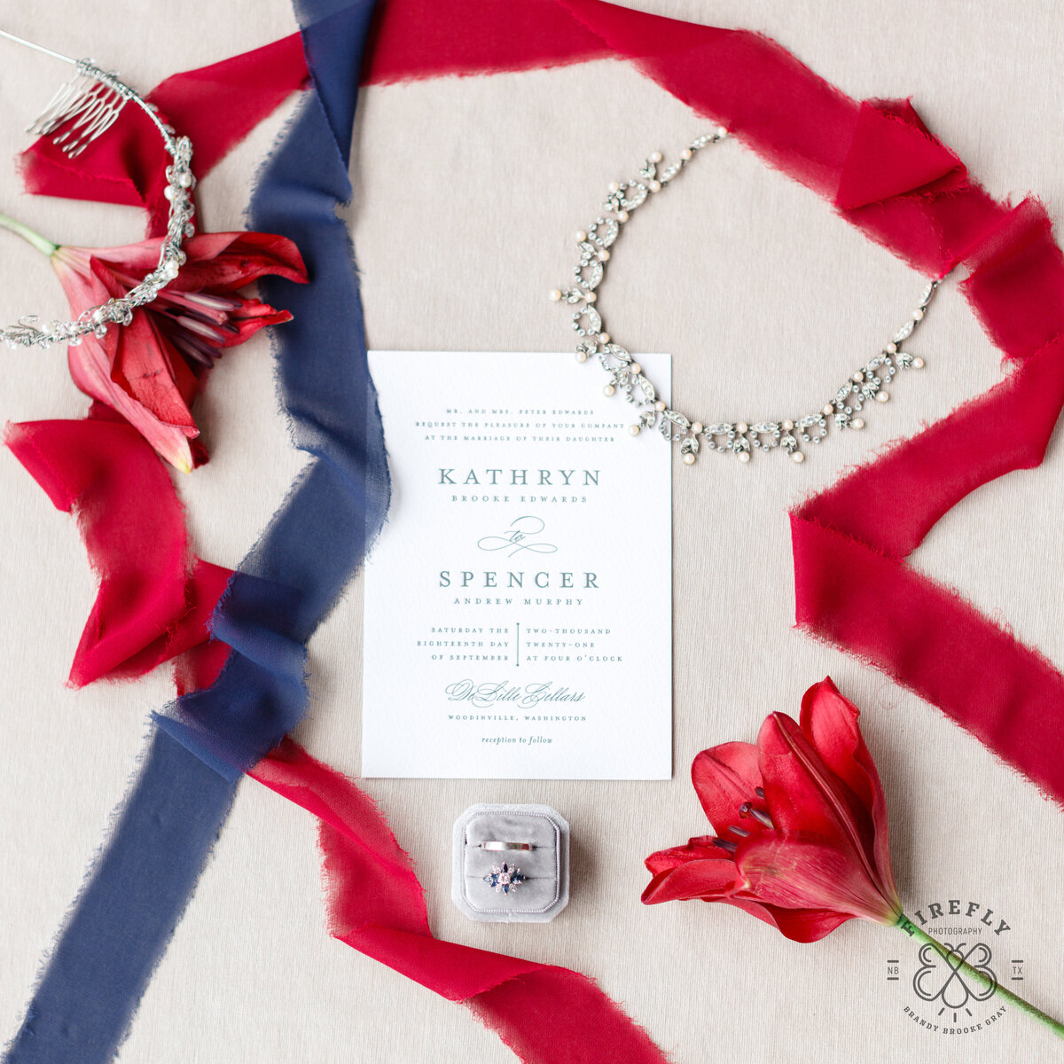 red and navy flat lay by San Antonio wedding photographer Firefly Photography