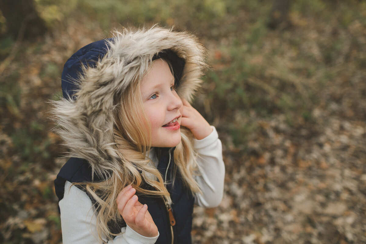 little girl with fur hood