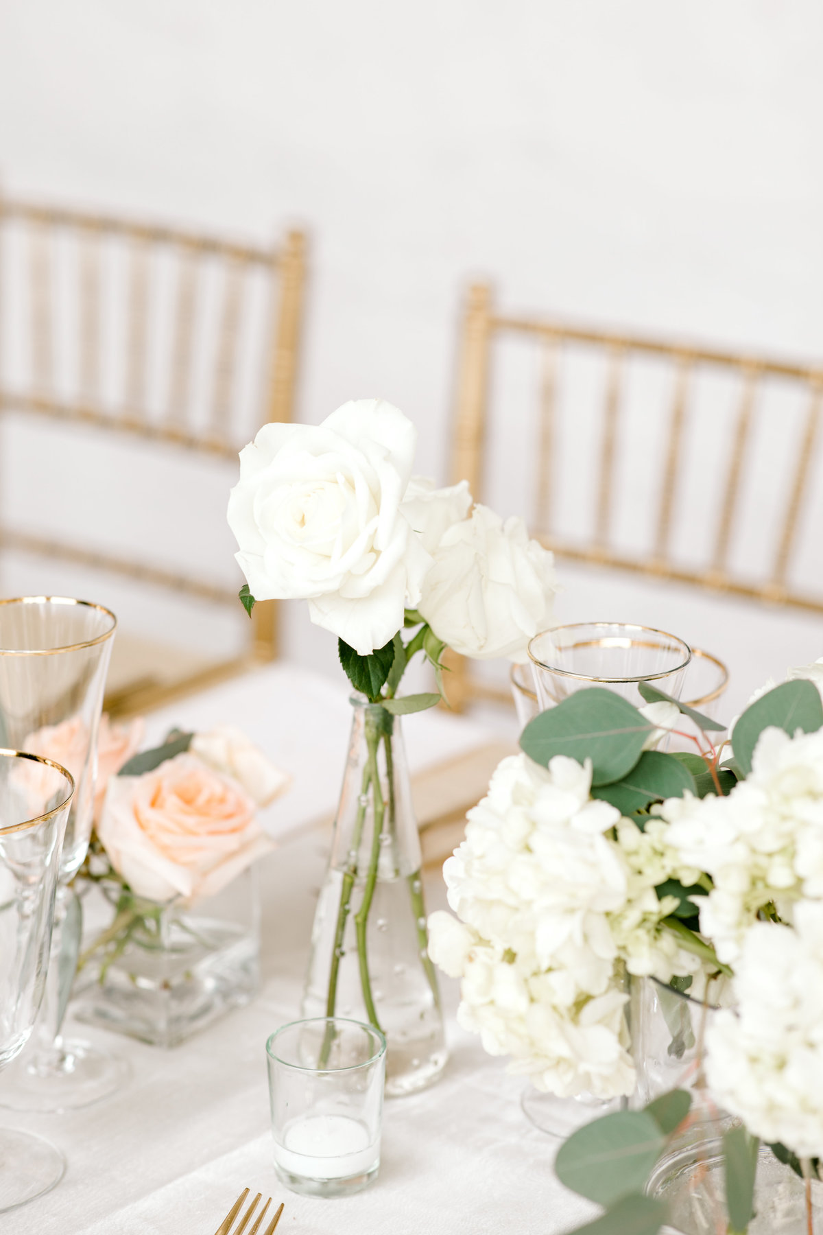 White rose centerpiece for wedding reception