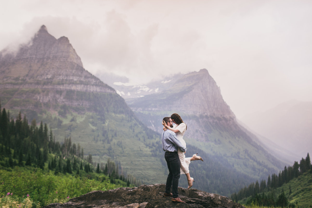 man holding woman up