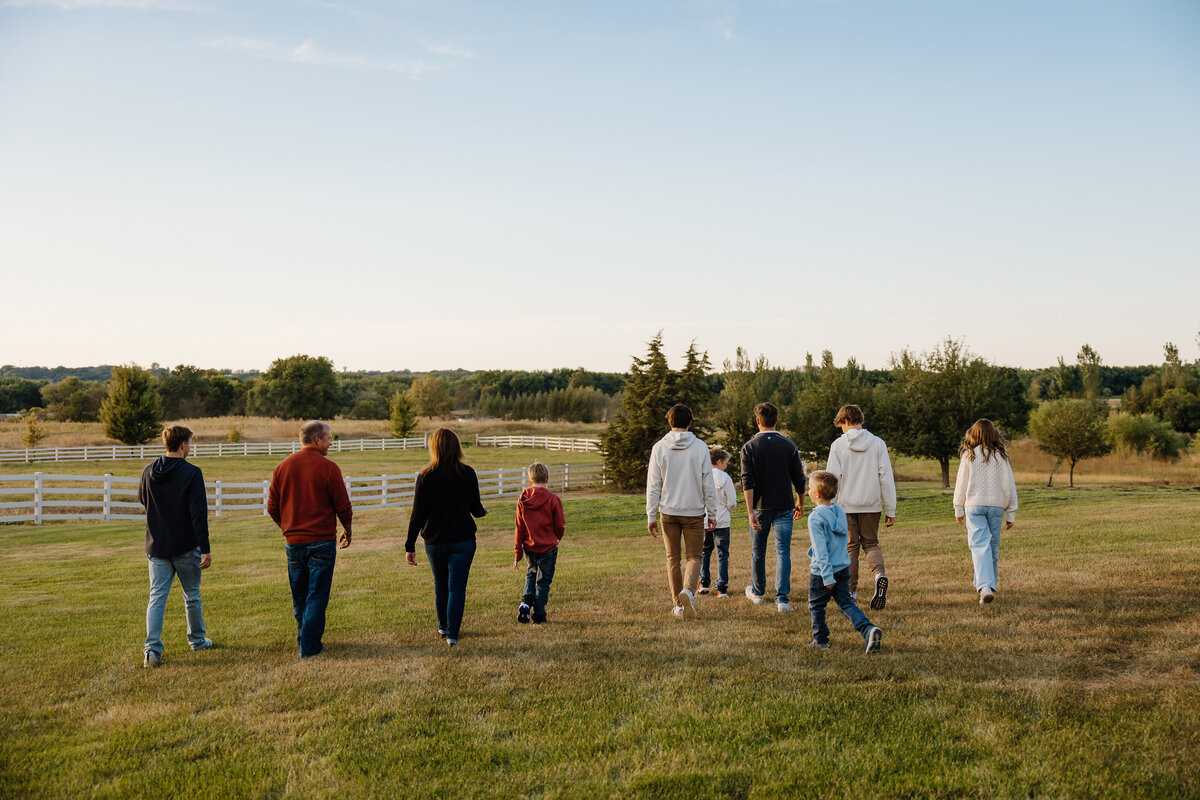 A family walking together in a field