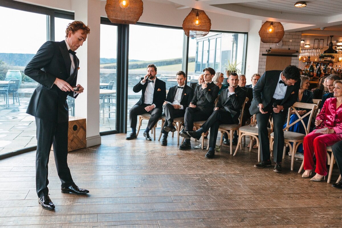 Groom checks phone is switched off ahead of wedding ceremony