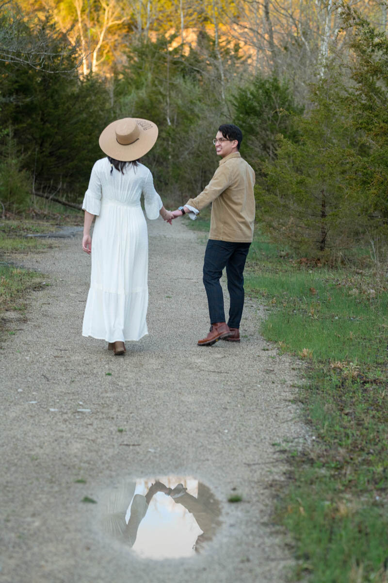 Indiana-elopement-packages-couples-reflection-in-puddle